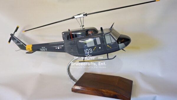 Model of UH-1N Twin Huey US NAVY 103 Aircraft with detailed craftsmanship.